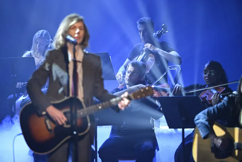 Sacha Baron Cohen Slips Into Beck’s String Section on ‘The Tonight Show’ to Play Cello