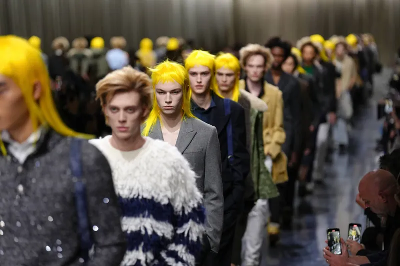 Men’s Fashion Week FW26, From Milan to Paris: Prada’s Giant Cuffs, Dior’s Yellow Wigs and a Feid-Fronted Show